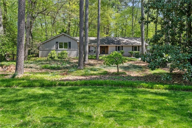 1959 Grand Prix Dr NE, Atlanta, GA 30345 - ranch-style house with board and batten siding and a front yard