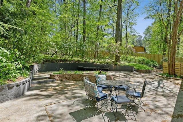 1959 Grand Prix Dr NE, Atlanta, GA 30345 - view of patio featuring fence and outdoor dining space