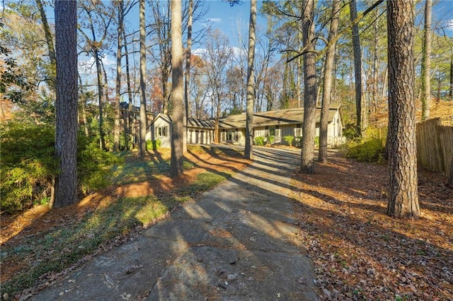 view of street featuring driveway