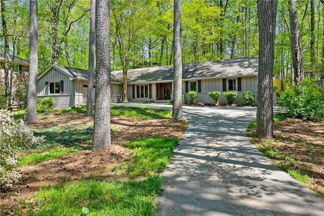 1959 Grand Prix Dr NE, Atlanta, GA 30345 - single story home featuring curved driveway and board and batten siding