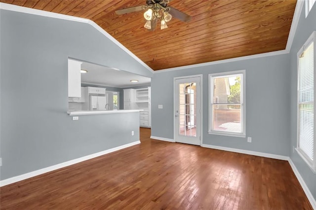 unfurnished living room featuring hardwood / wood-style floors, vaulted ceiling, crown molding, and wood ceiling