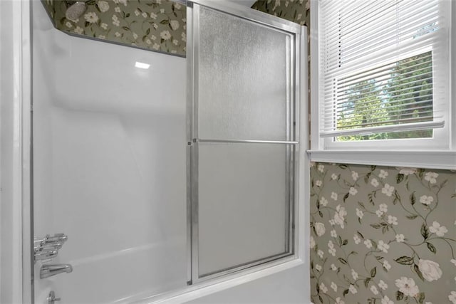 bathroom featuring enclosed tub / shower combo