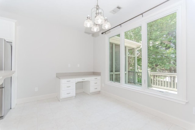 1122 Cayuga Ct, Dacula, GA 30019 - unfurnished office featuring a chandelier and built in desk