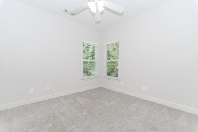 1122 Cayuga Ct, Dacula, GA 30019 - carpeted spare room featuring baseboards and ceiling fan