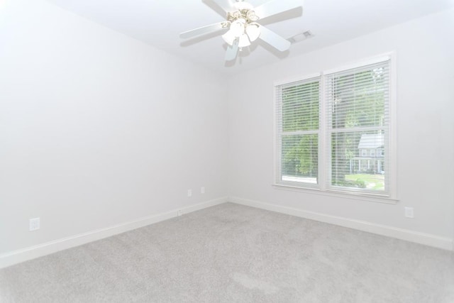 1122 Cayuga Ct, Dacula, GA 30019 - empty room featuring light colored carpet and ceiling fan