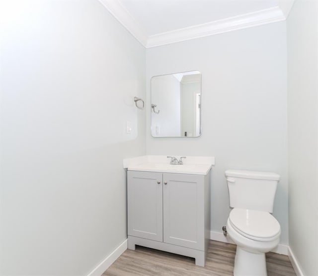 1122 Cayuga Ct, Dacula, GA 30019 - half bathroom with crown molding, wood finished floors, and vanity