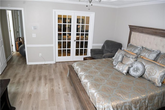 9130 Charlton Pl, Douglasville, GA 30135 - bedroom featuring french doors, wood finished floors, and crown molding