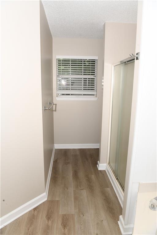 9130 Charlton Pl, Douglasville, GA 30135 - office featuring ceiling fan, wood finished floors, and plenty of natural light