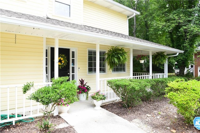 9130 Charlton Pl, Douglasville, GA 30135 - entrance to property with covered porch and roof with shingles