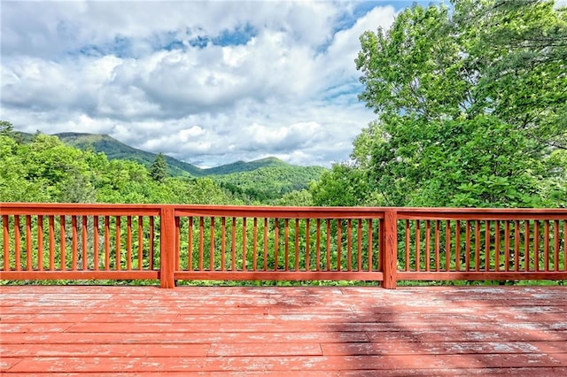 wooden terrace featuring a mountain view