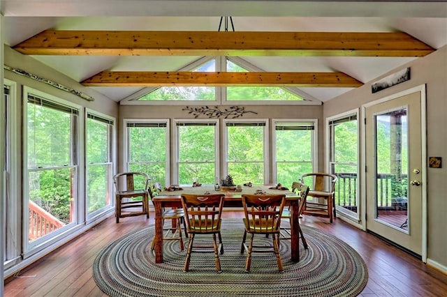 sunroom / solarium featuring hardwood / wood-style floors and plenty of natural light