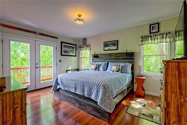 bedroom featuring french doors, access to exterior, and wood-type flooring