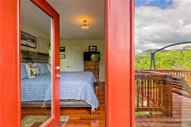 bedroom featuring wood finished floors