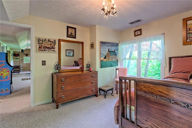 bedroom with light colored carpet, a chandelier, and baseboards