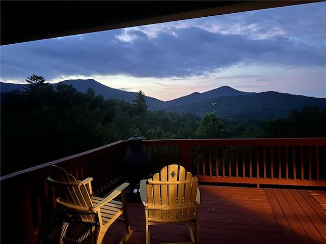 wooden terrace with a mountain view