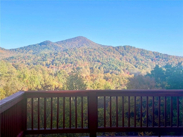 mountain view featuring a heavily wooded area
