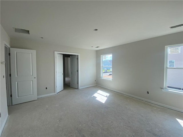 4678 Glore Rd SW, Mableton, GA 30126 - unfurnished bedroom featuring baseboards and a closet