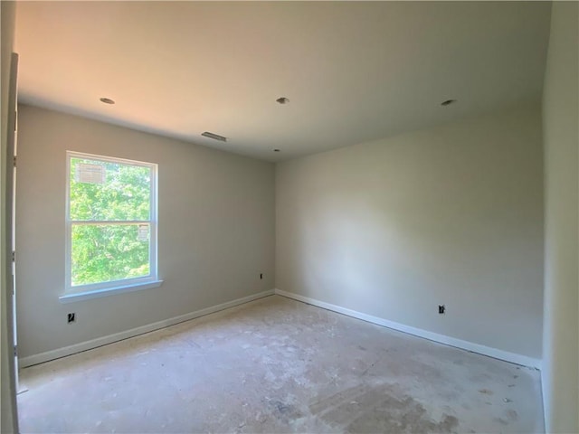 4678 Glore Rd SW, Mableton, GA 30126 - empty room with baseboards and unfinished concrete floors