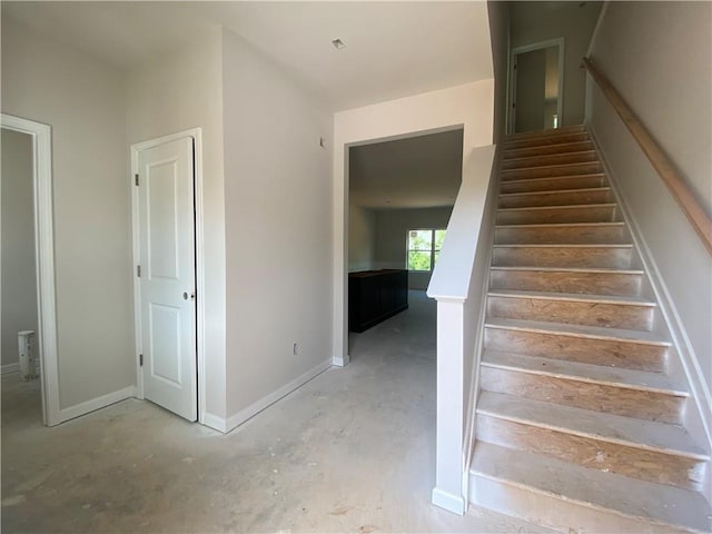 4678 Glore Rd SW, Mableton, GA 30126 - staircase featuring concrete floors and baseboards