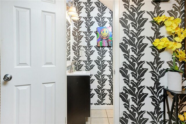 bathroom with tile patterned floors