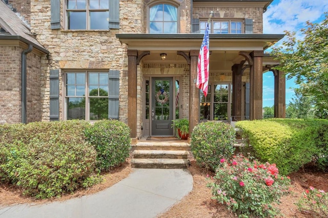 entrance to property with stone siding
