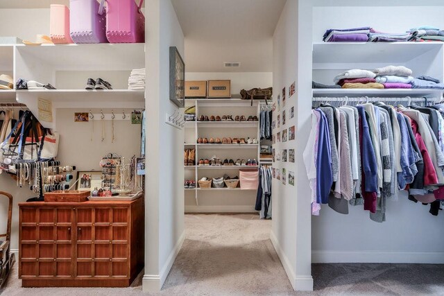 spacious closet featuring carpet and visible vents