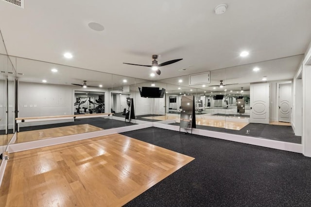 workout area with a ceiling fan and recessed lighting