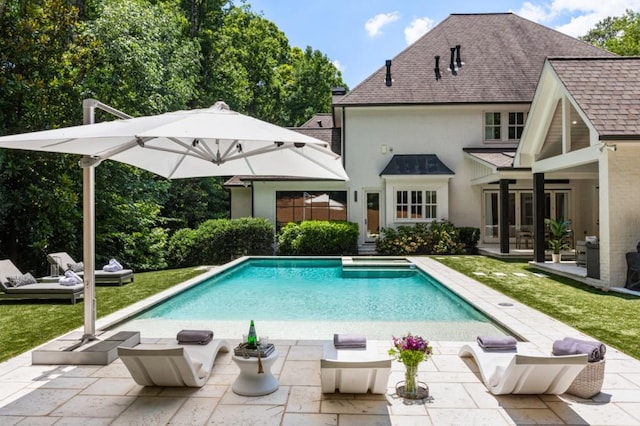 outdoor pool featuring a patio