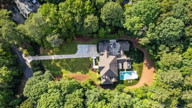 view of property location featuring a pool