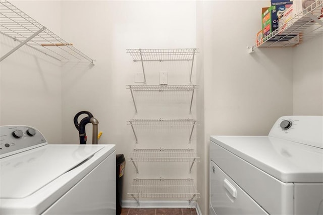 laundry area featuring washer and dryer and laundry area