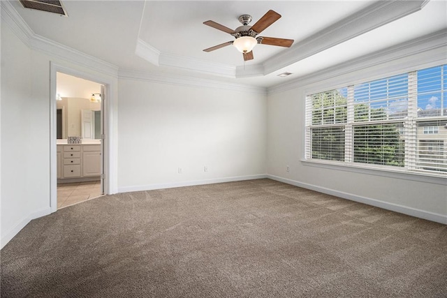 1935 Cobblestone Cir NE, Brookhaven, GA 30319 - empty room with light colored carpet, crown molding, a ceiling fan, and a raised ceiling