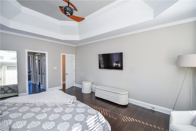 bedroom with ceiling fan, crown molding, and a tray ceiling