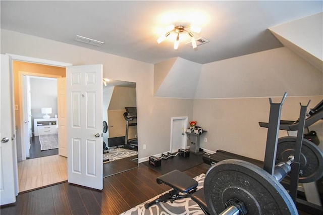 workout room featuring dark hardwood / wood-style flooring