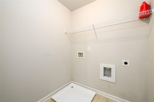 clothes washing area featuring laundry area, hookup for a washing machine, baseboards, and hookup for an electric dryer