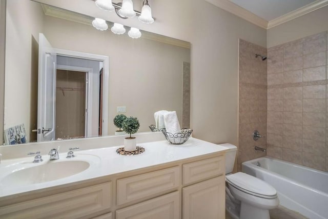 full bathroom with tiled shower / bath combo, toilet, crown molding, and vanity