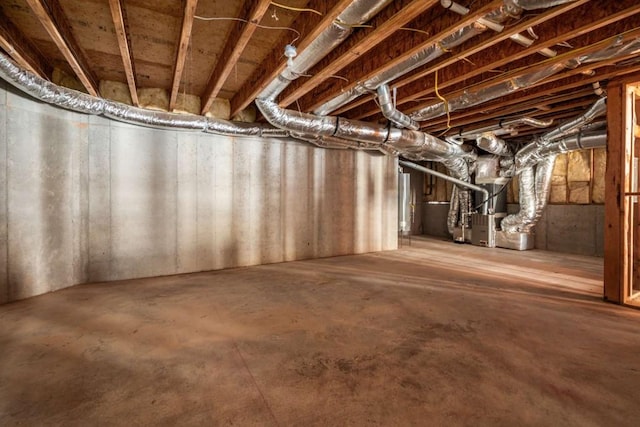 basement featuring heating unit