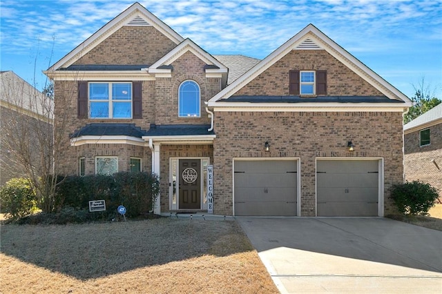 view of front facade featuring a garage, concrete driveway, and brick siding