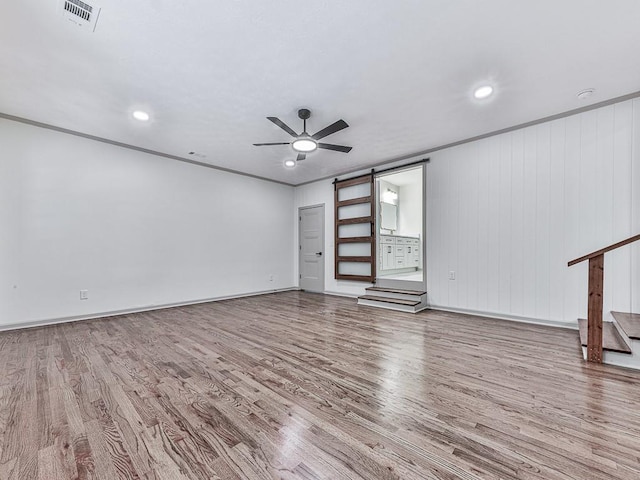 221 Wonewok Dr, Canton, GA 30114 - unfurnished room featuring wood finished floors, ceiling fan, recessed lighting, and crown molding