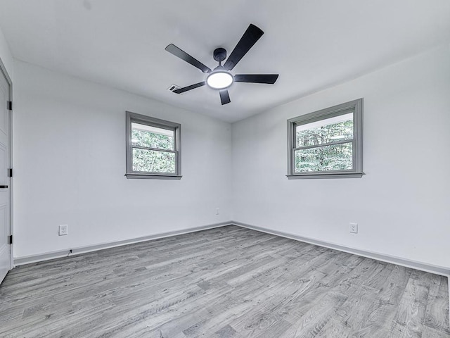 221 Wonewok Dr, Canton, GA 30114 - spare room with wood finished floors and a ceiling fan