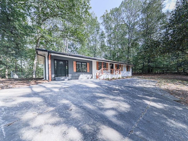 221 Wonewok Dr, Canton, GA 30114 - view of front of home with covered porch and driveway