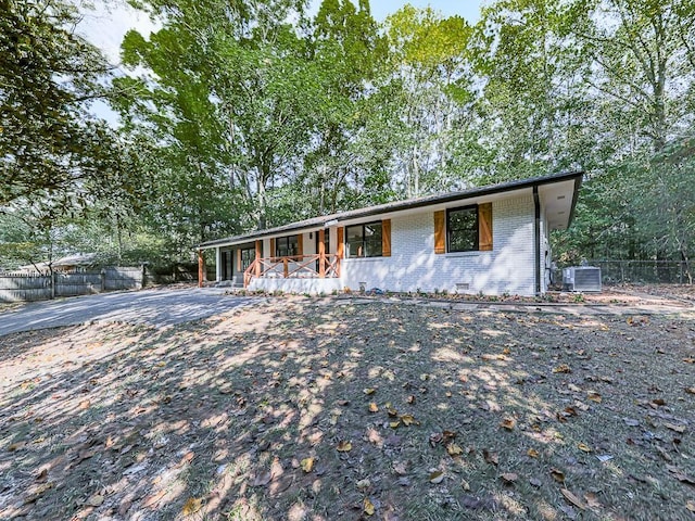 221 Wonewok Dr, Canton, GA 30114 - ranch-style home featuring covered porch and brick siding