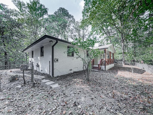 221 Wonewok Dr, Canton, GA 30114 - view of home's exterior with crawl space and brick siding