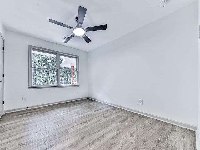 221 Wonewok Dr, Canton, GA 30114 - empty room with light wood-type flooring, a smoke detector, and a ceiling fan