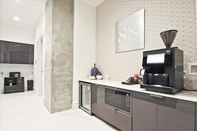 bathroom with walk in shower and vanity