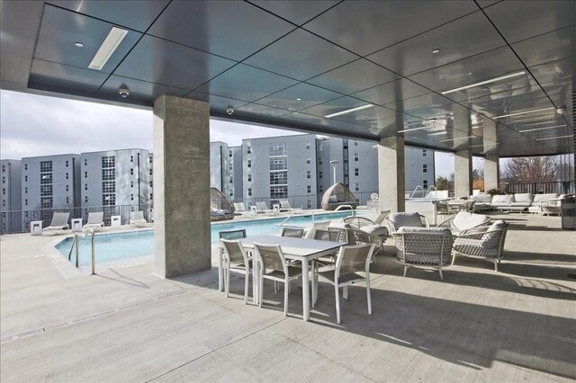 recreation room featuring hardwood / wood-style flooring, pool table, and floor to ceiling windows