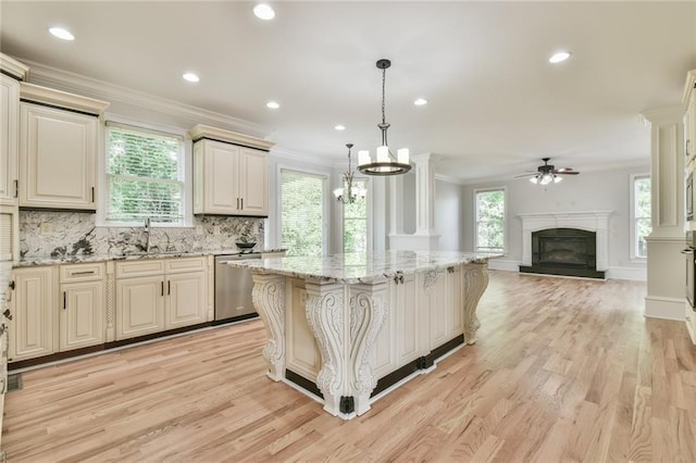 5121 Hope Ct SW, Lilburn, GA 30047 - kitchen with dishwasher, open floor plan, light wood-type flooring, a sink, and recessed lighting