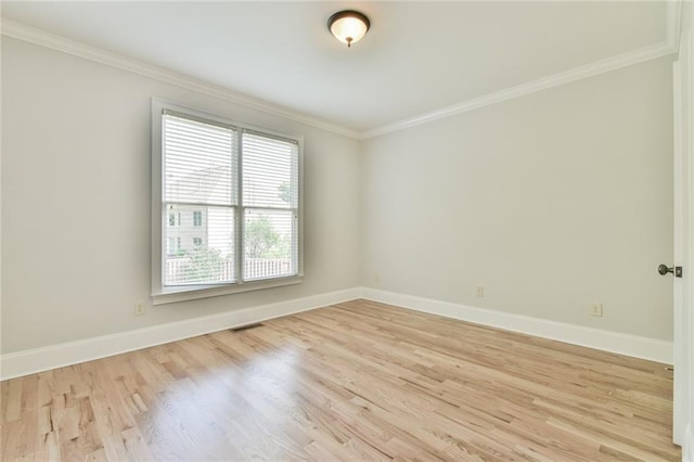 5121 Hope Ct SW, Lilburn, GA 30047 - empty room with ornamental molding, light wood-style floors, and baseboards