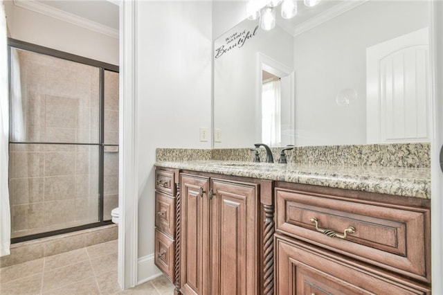 5121 Hope Ct SW, Lilburn, GA 30047 - full bath featuring toilet, ornamental molding, vanity, a stall shower, and tile patterned flooring