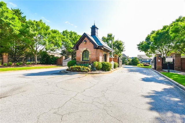 5121 Hope Ct SW, Lilburn, GA 30047 - view of asphalt road with curbs
