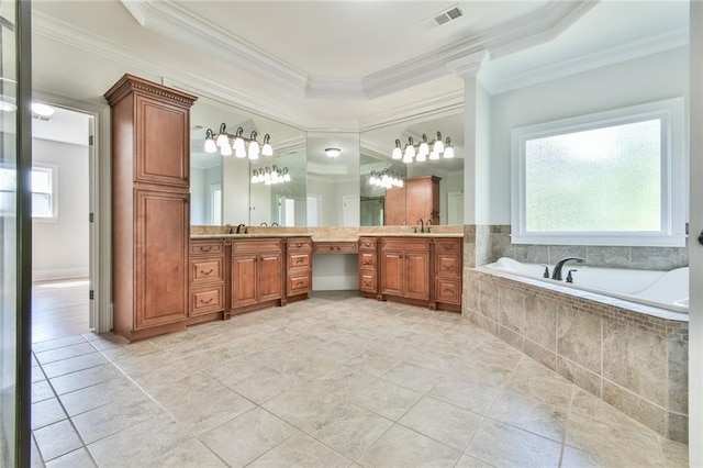 5121 Hope Ct SW, Lilburn, GA 30047 - bathroom with double vanity, ornamental molding, a garden tub, and tile patterned floors
